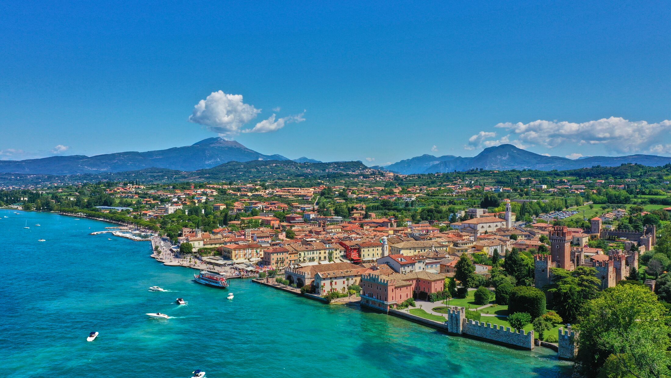 Panoramic view of the resort town of Lazise on Lake Garda, north of Italy. Aerial photography with drone.