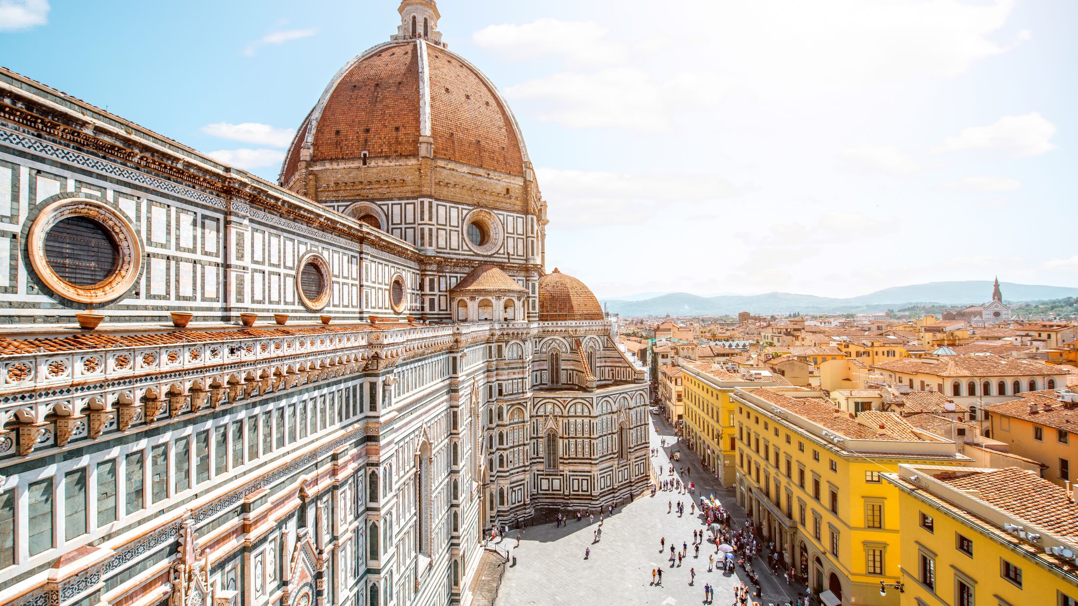 Top cityscape view on the dome of Santa Maria del Fiore church and old town in Florence