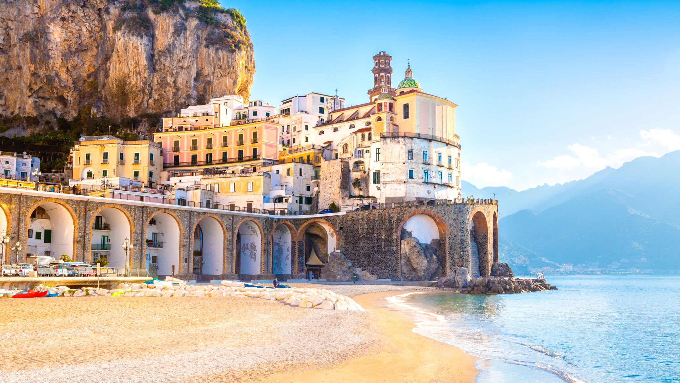 Morning view of Amalfi cityscape on coast line of mediterranean sea, Italy