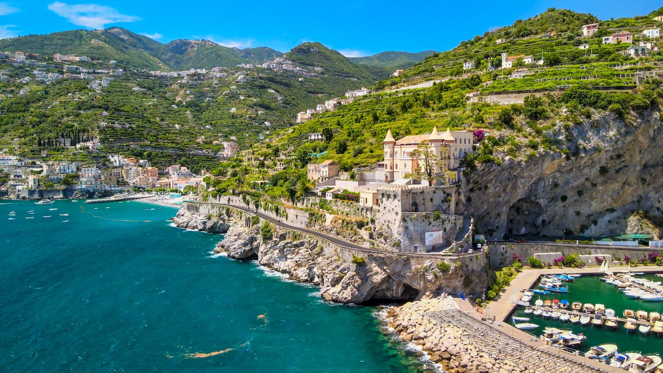 Amazing aerial view of Maiori and Minori along Amalfi Coast in summer season, Italy. Drone viewpoint.