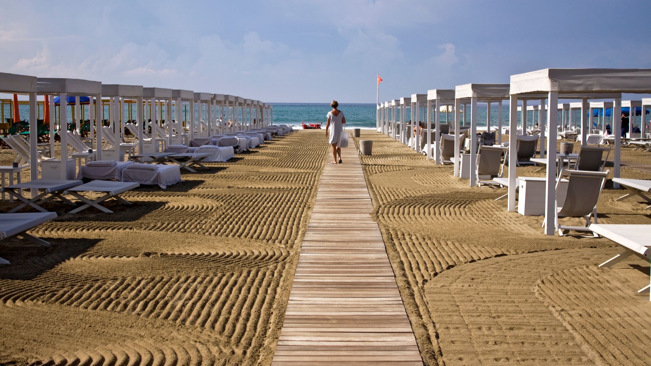 Forte dei Marmi beach with sun umbrellas and tents