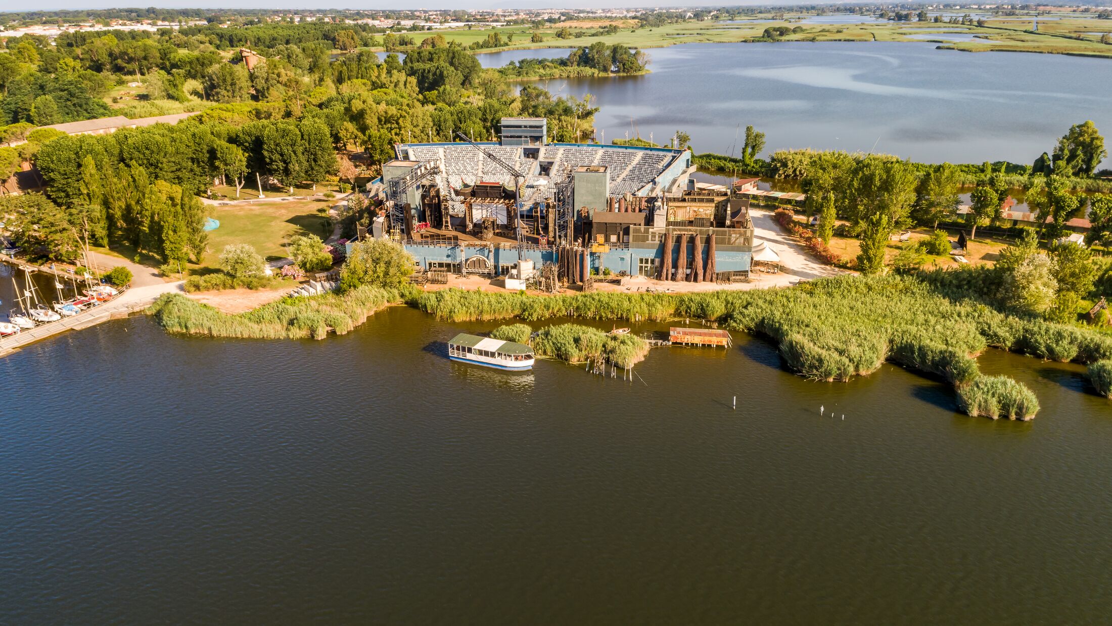 Aerial View of the open-air Giacomo Puccini Grand Theate located in Torre del Lago Puccini on Lake Massaciuccoli in Viareggio, Tuscany, Italy