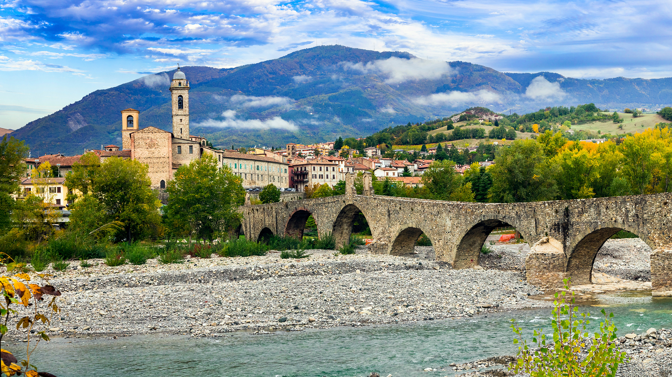 Bobbio - beautiful medieval village (borgo) of Emilia-Romagna in Italy. Panorama of old town and ancient bridge