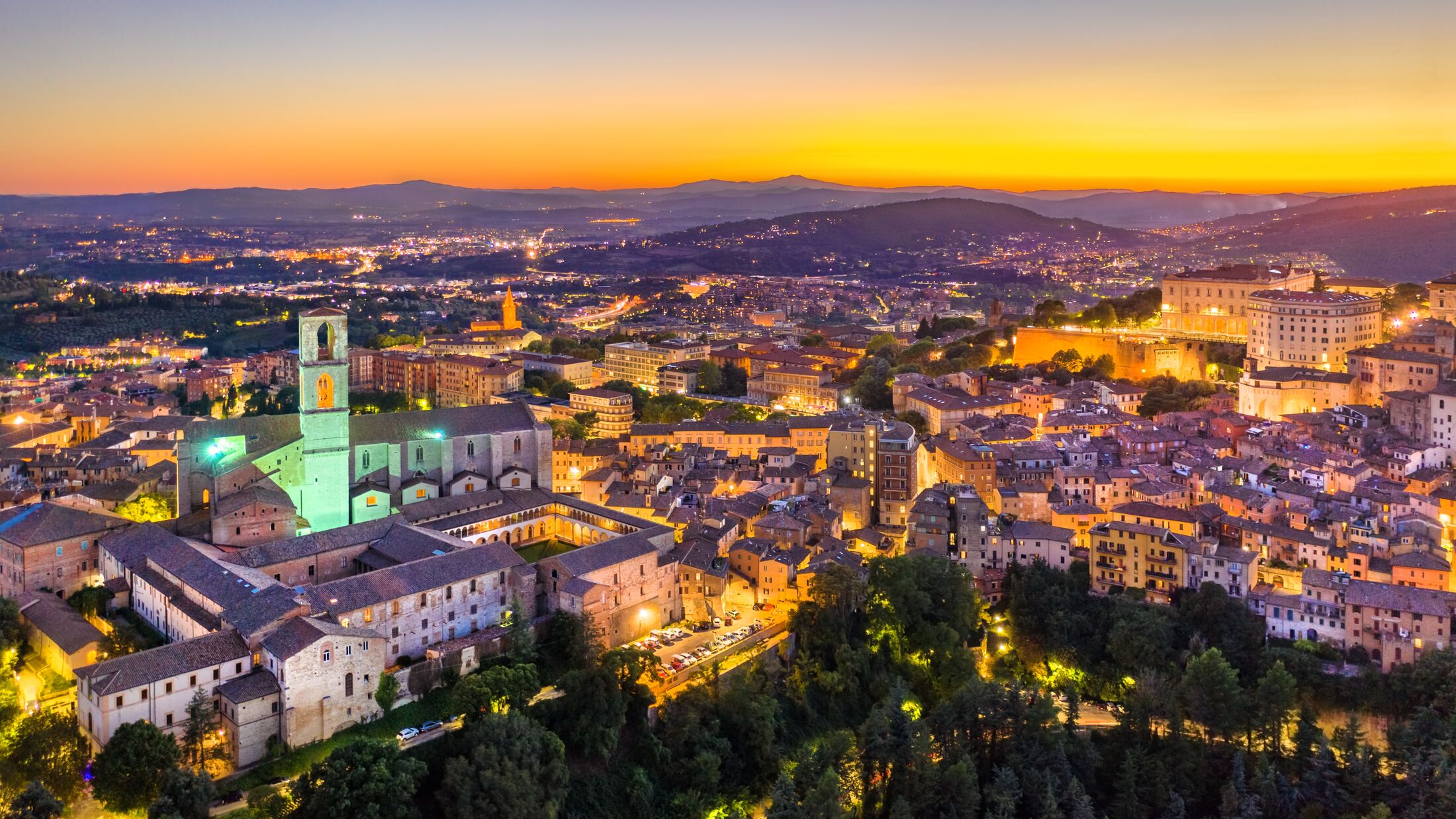 Aerial view of San Domenico Basilica in Perugia, Italy at sunset