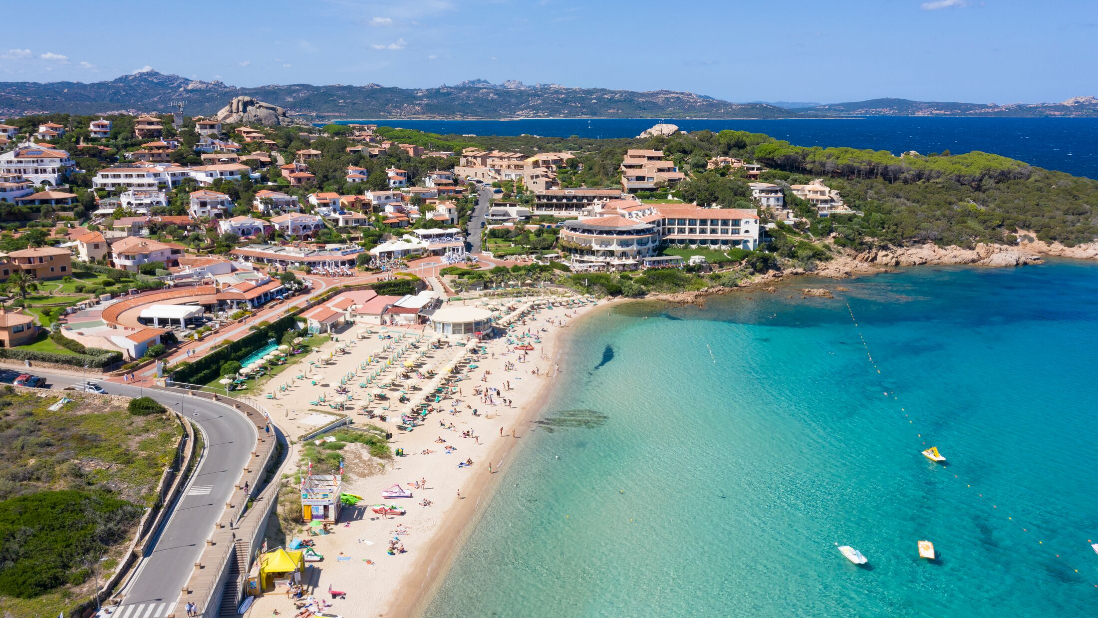 Aerial image of Baja Sardinia beach in Costa Smeralda, Sardinia