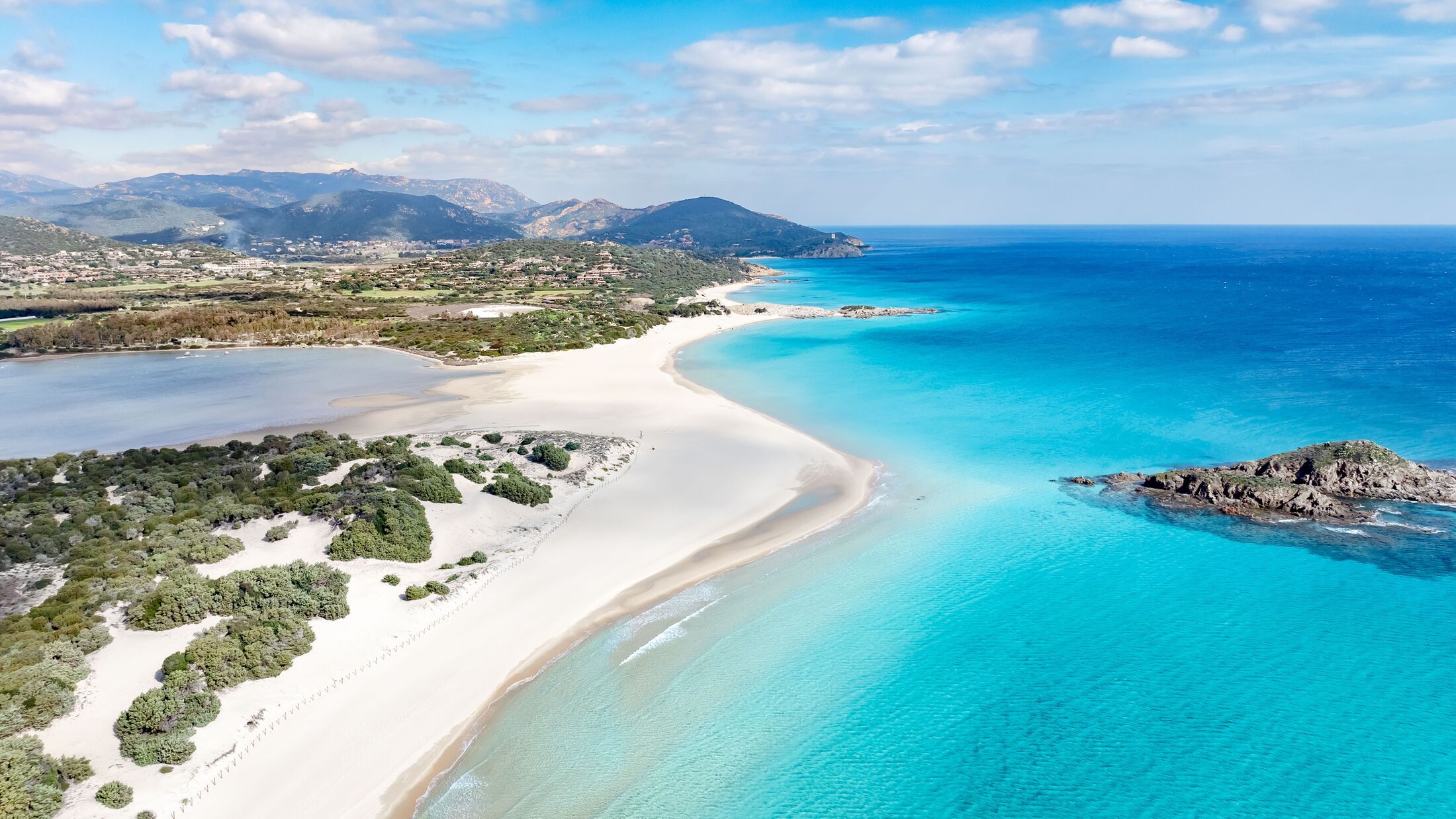 Aerial view of Su Giudeu beach in Chia, south Sardinia