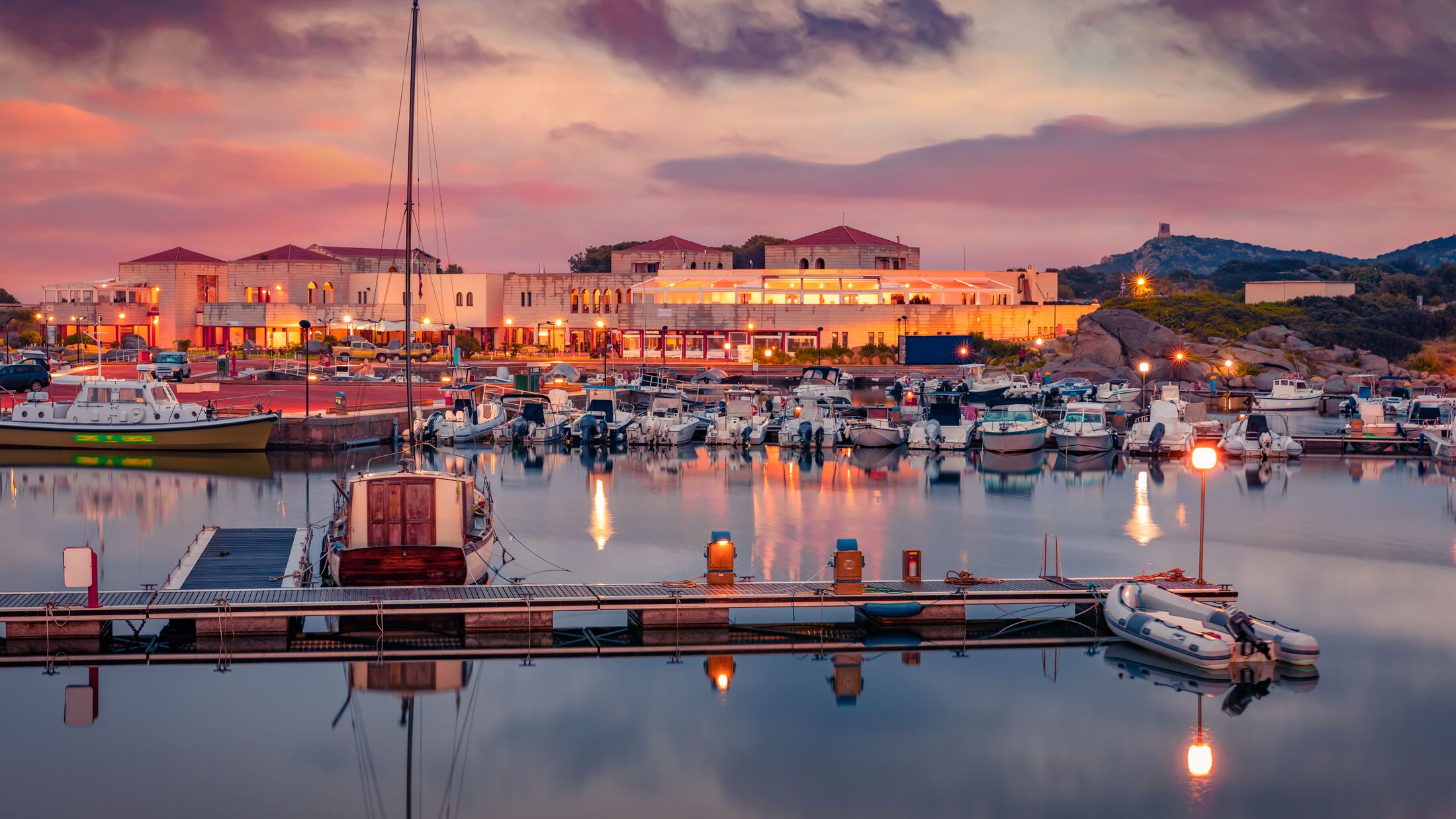 Dramatic morning view of Villasimius port. Attractive summer sunrise on Sardinia island, Italy, Europe. Wonderful seascape of Mediterranean sea. Traveling concept background.