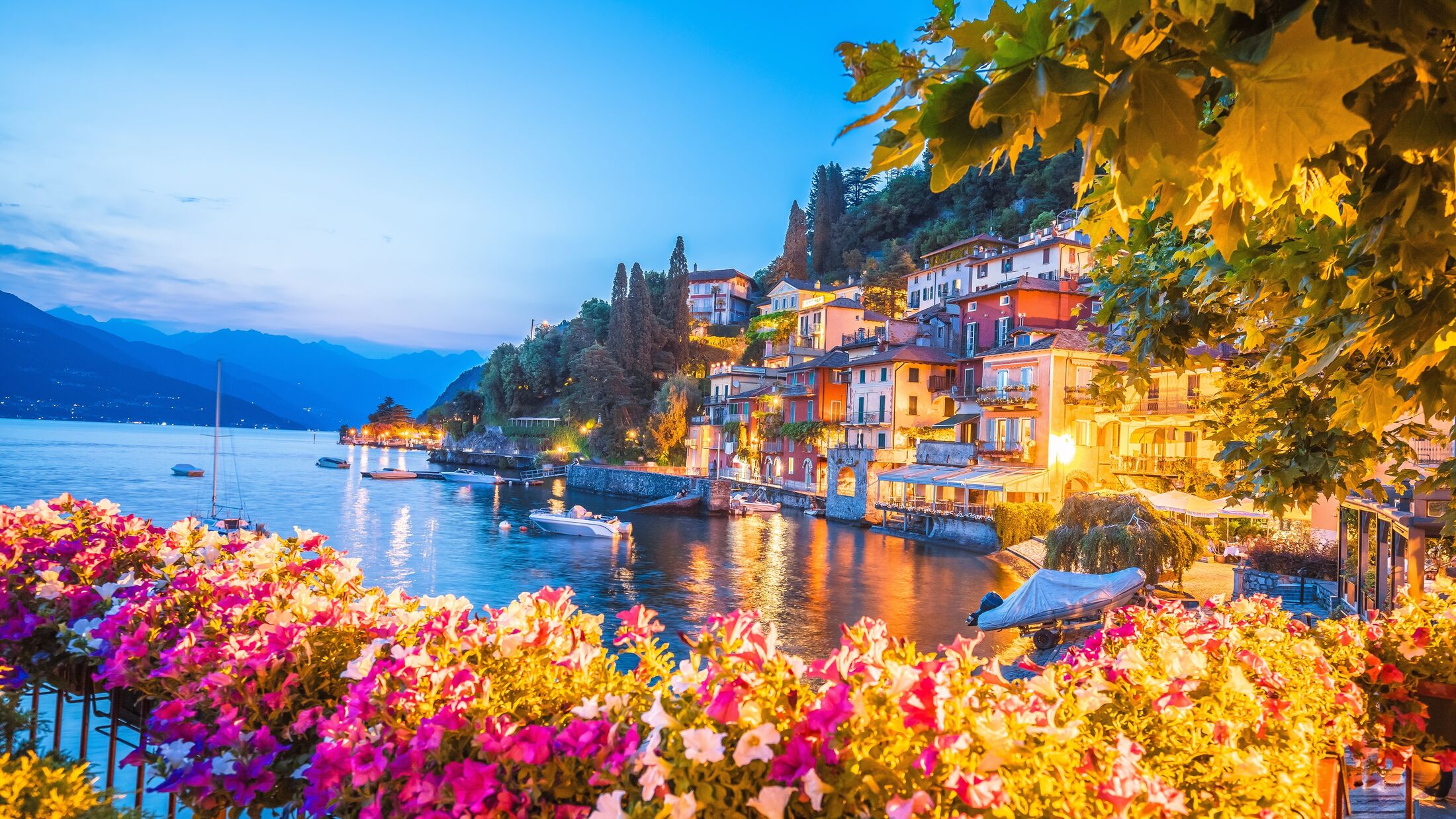 Colorful Varenna scenic lakeside waterfront and Como lake evening view, Como lake, Lombardy region of Italy