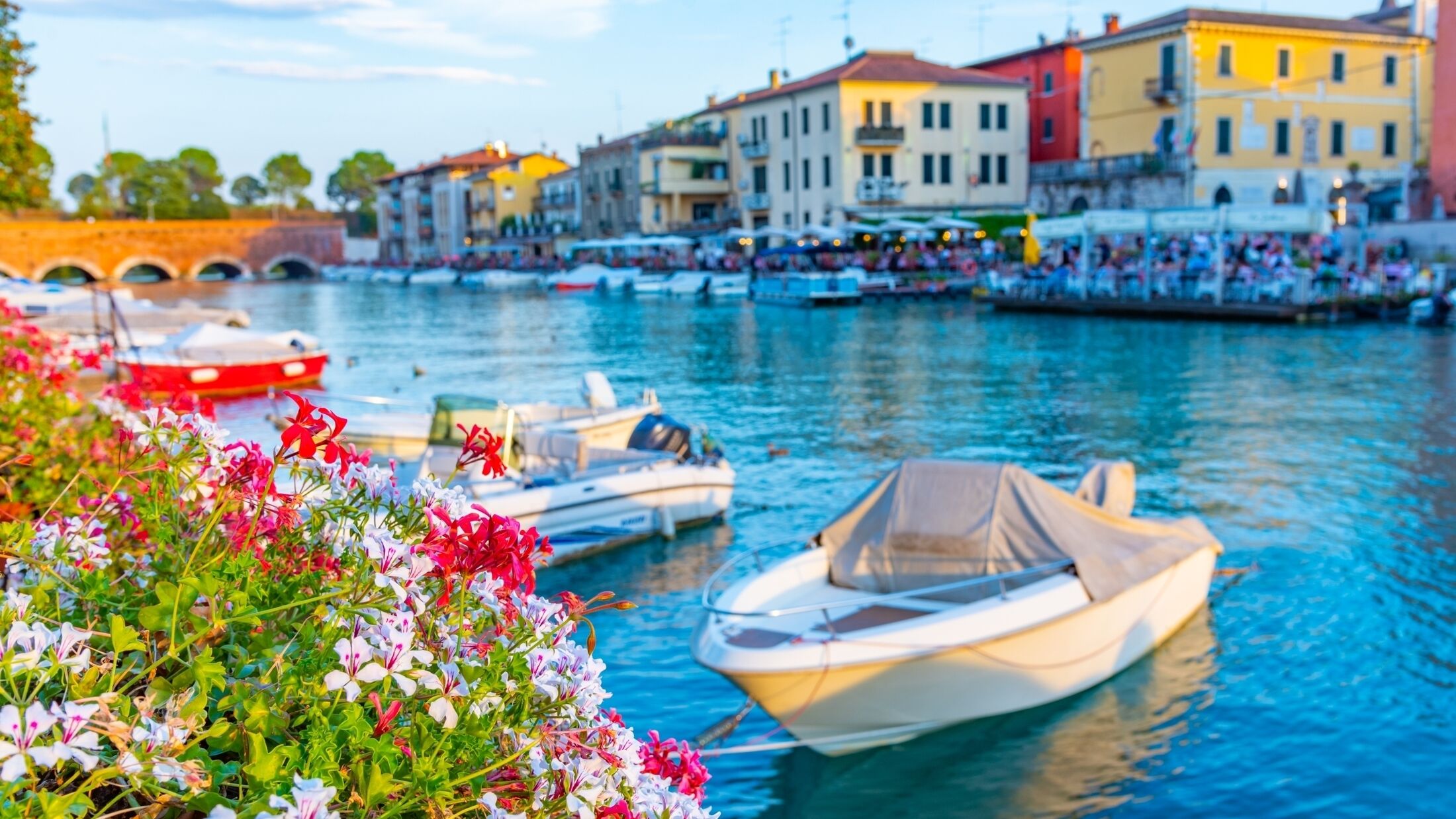 Sunset view of Canale di Mezzo in Italian town Peschiera del Garda.