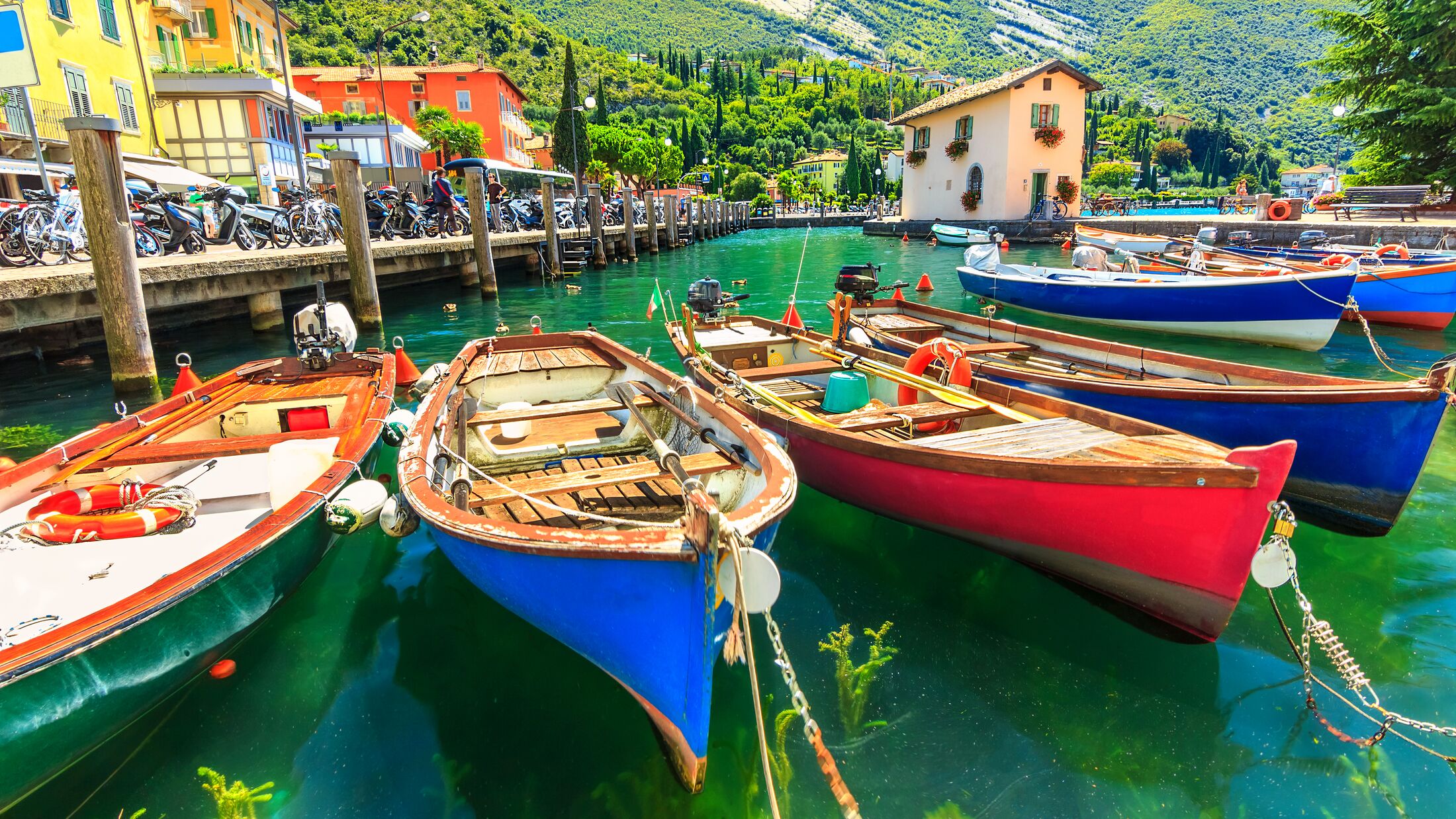 Summer landscape and wooden boats,Lake Garda,Torbole town,Italy,Europe