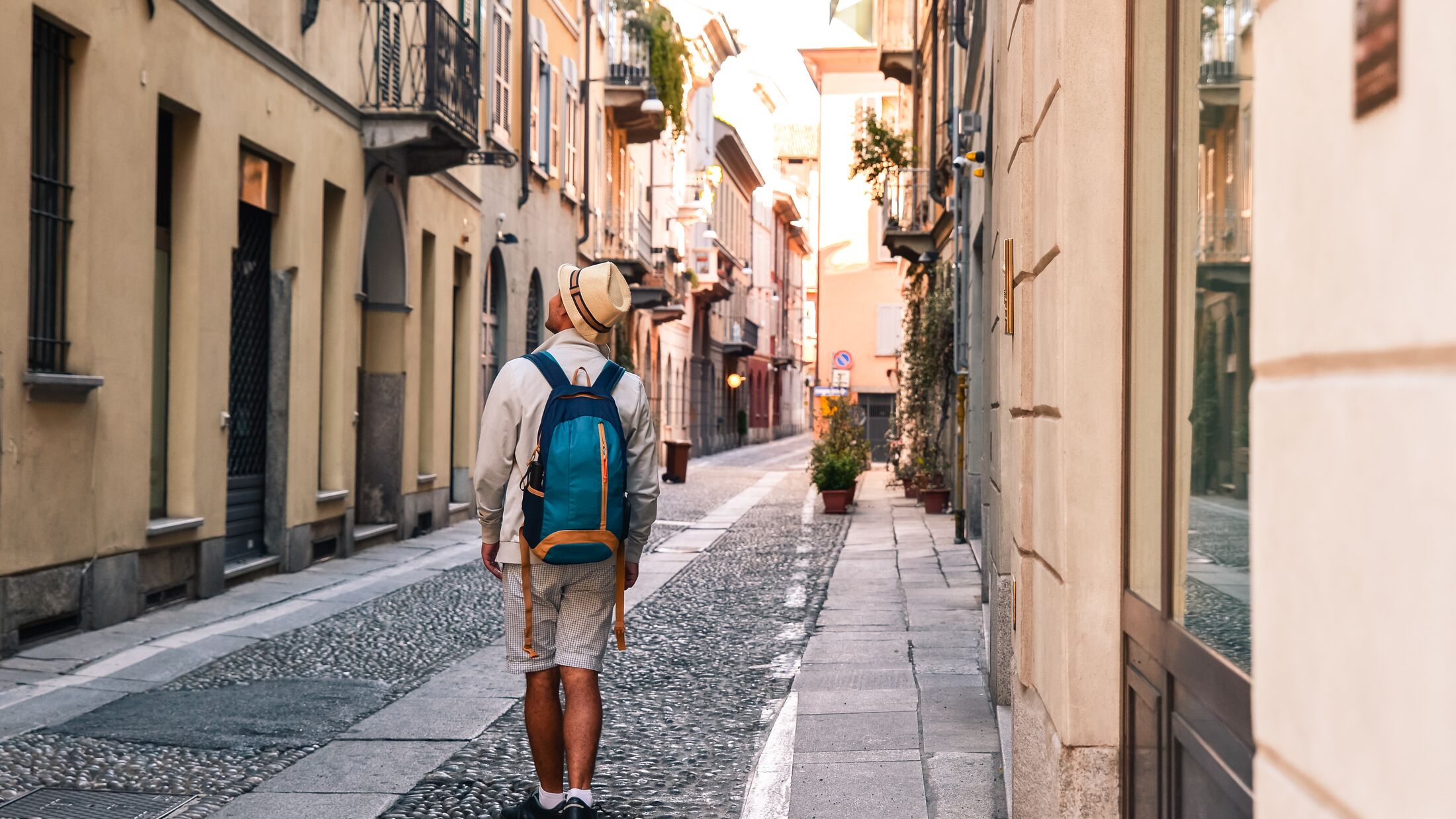 Man exploring the streets of Genoa