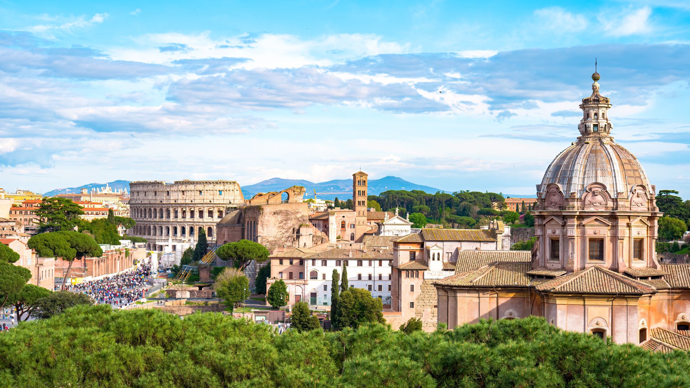 The Colosseum panorama, Colosseo, iconic amphitheatre Arena in the centre of the old town of Rome, Roma, just east of the Roman Forum.
