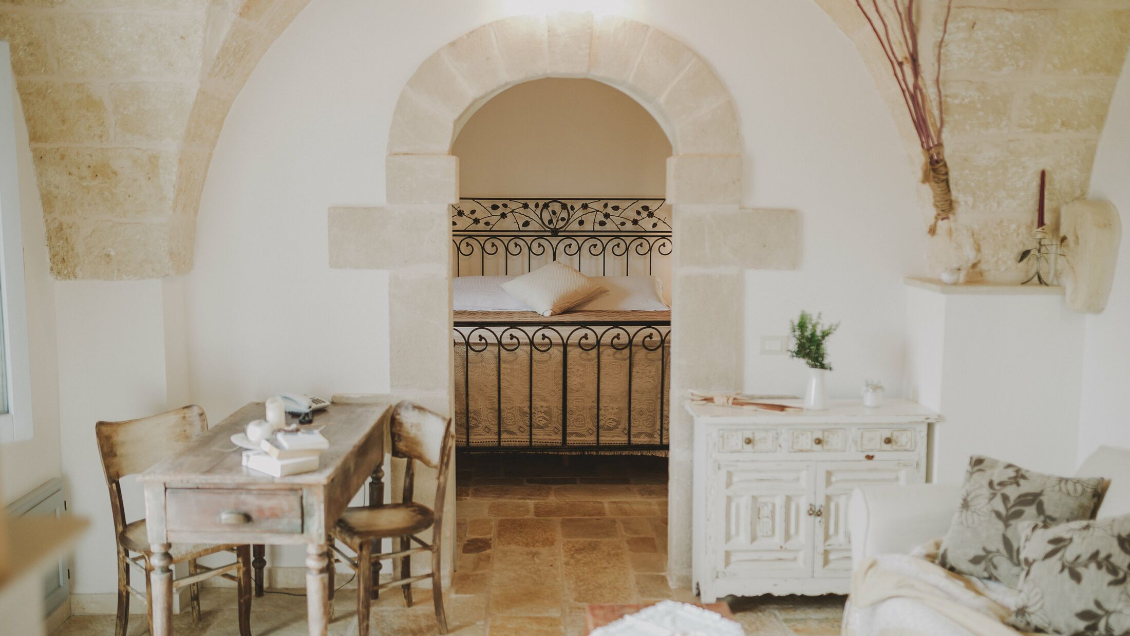 a room filled with furniture and a fireplace