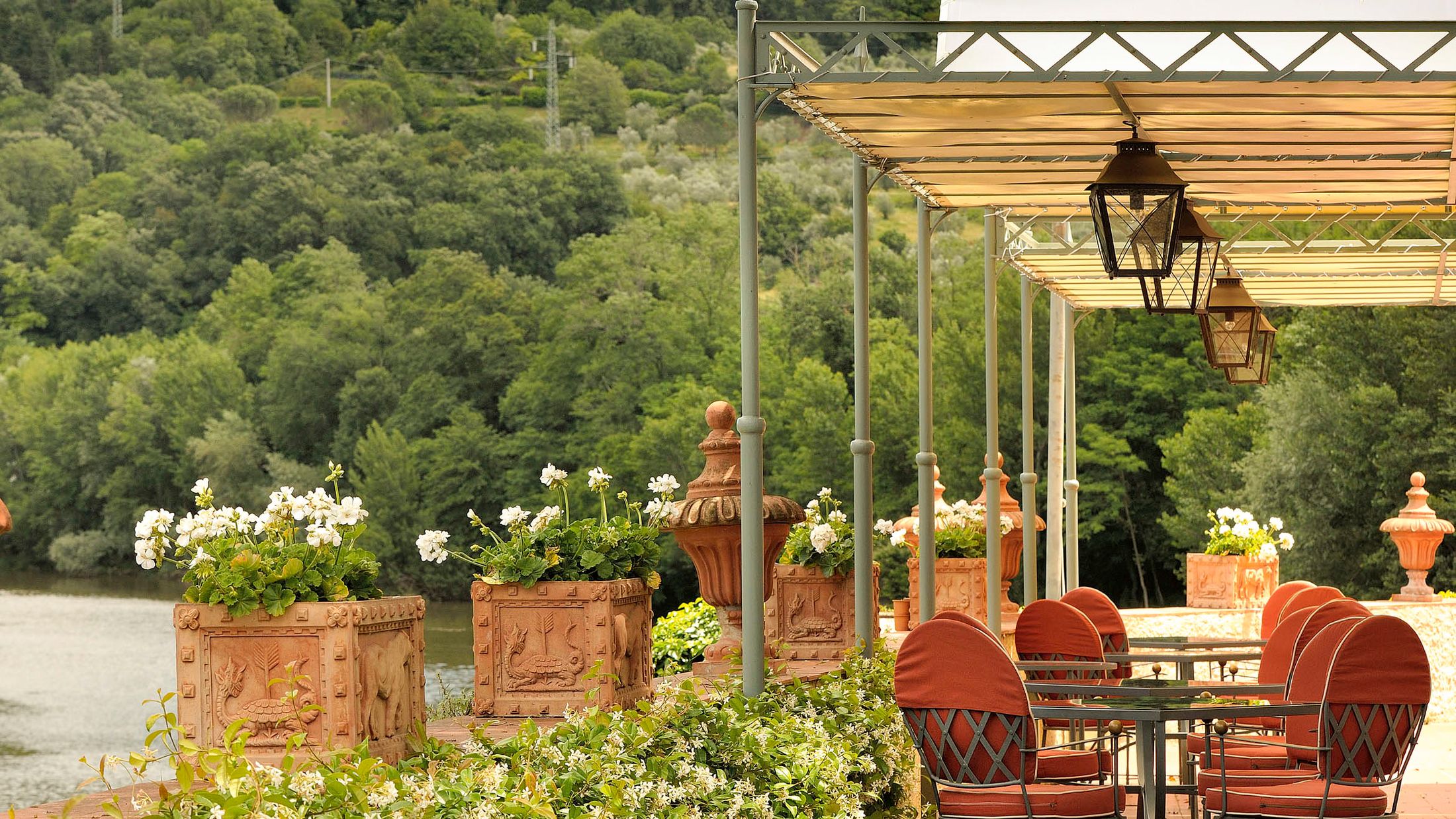 a group of people sitting in a garden