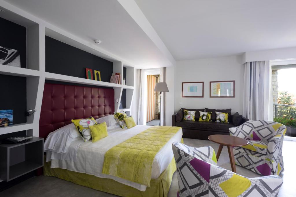 a bedroom with a large bed in a room