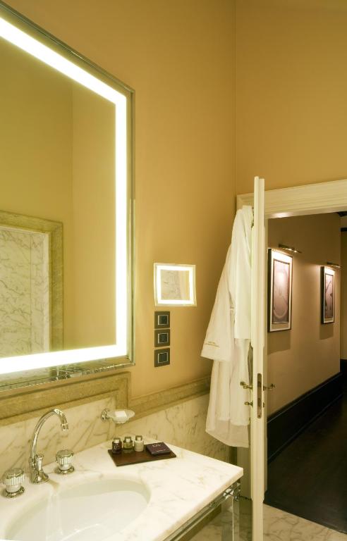 a double sink and large mirror