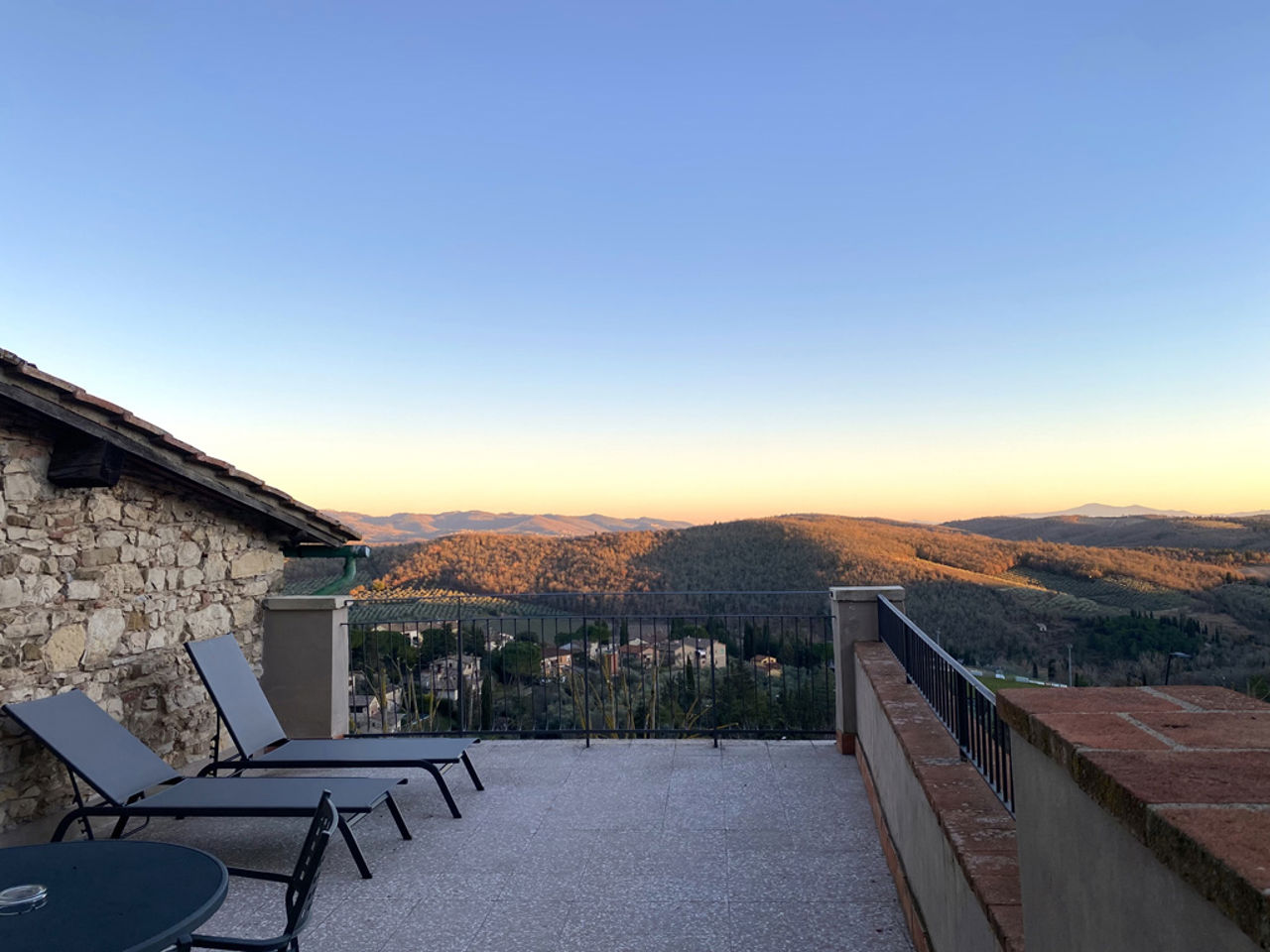 a building with a mountain in the background