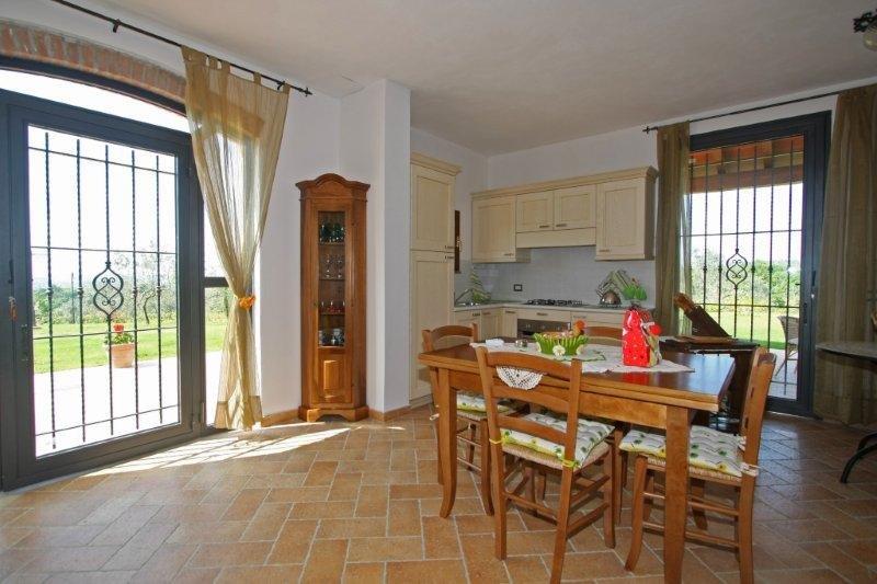 a dining room table in front of a window