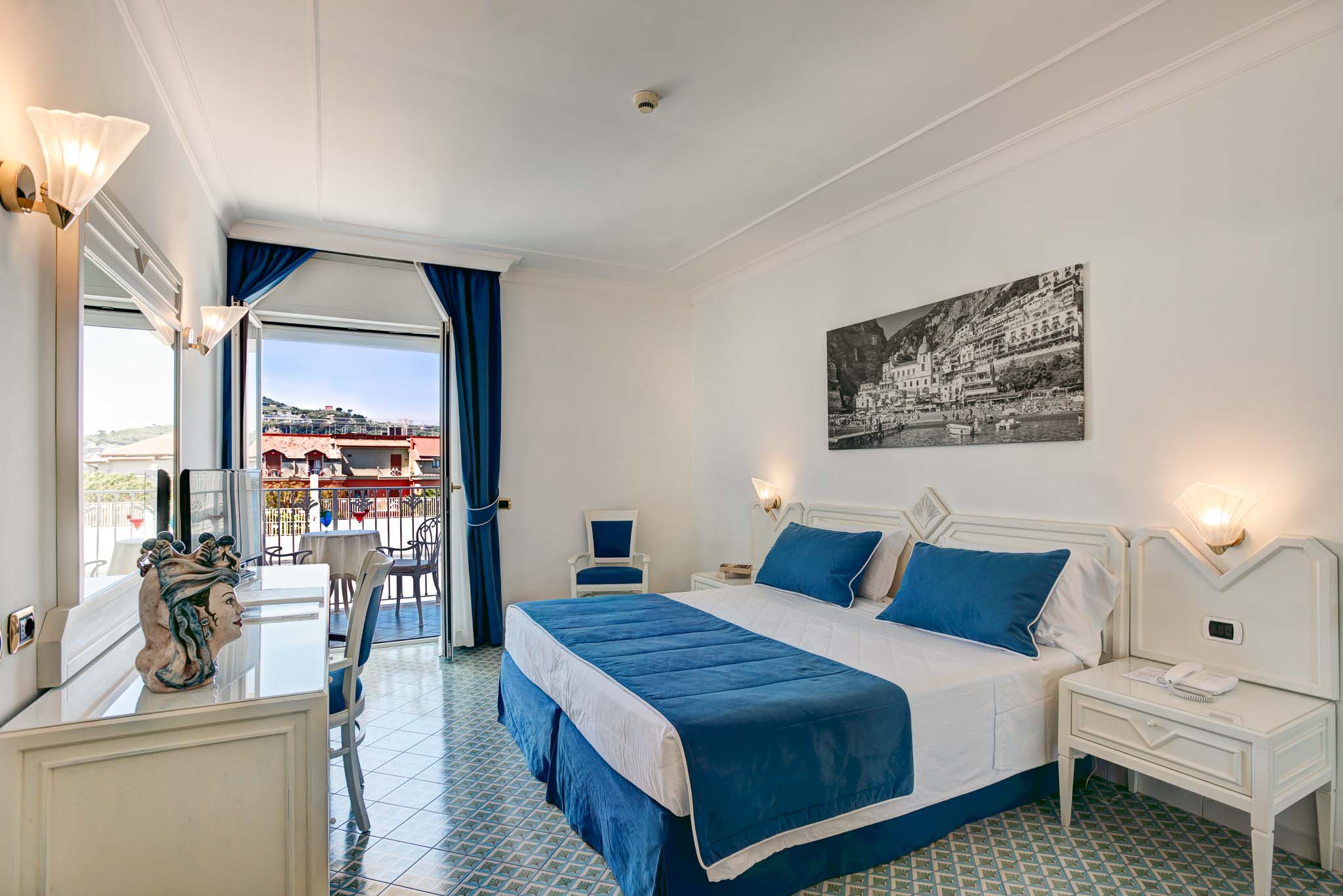 a bedroom with a bed in a room