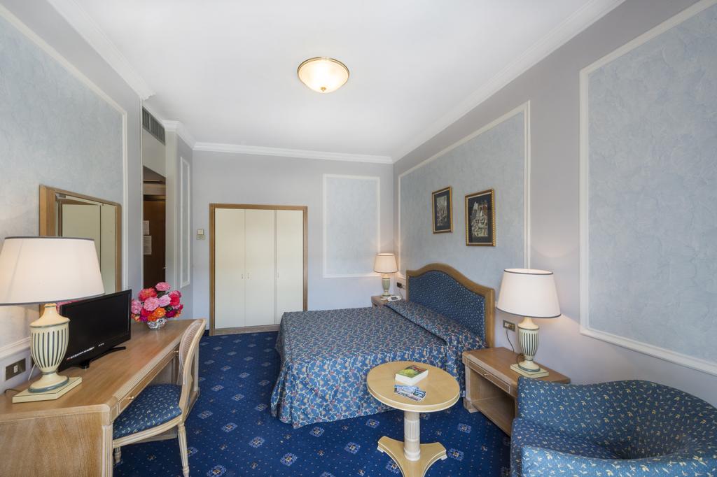 a living room filled with furniture and a table