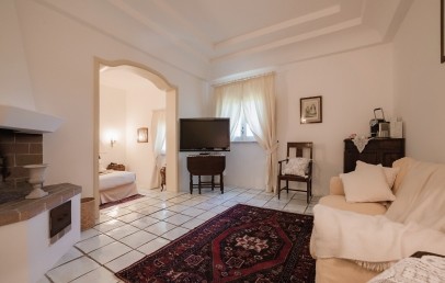 a bedroom with a bed in a room