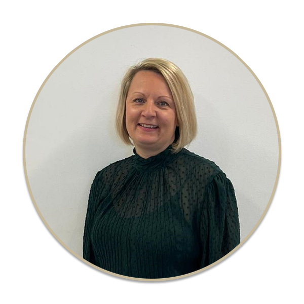 a woman standing in front of a mirror posing for the camera
