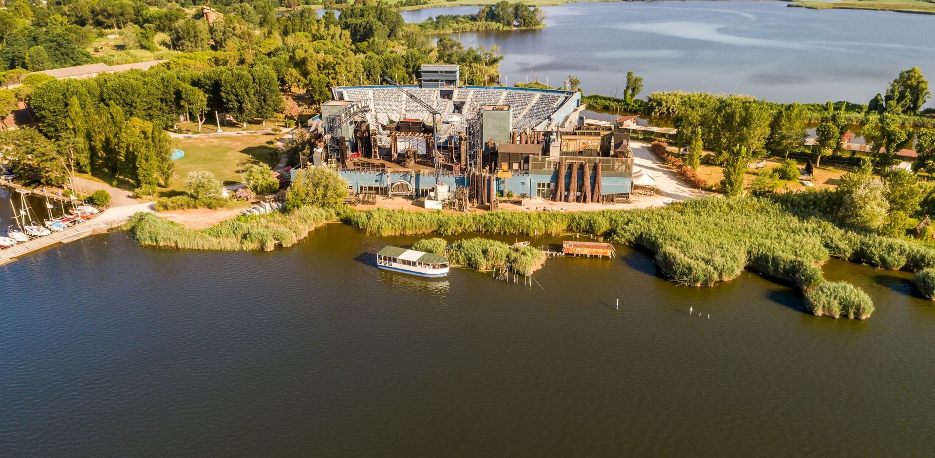 Aerial View of the open-air Giacomo Puccini Grand Theate located in Torre del Lago Puccini on Lake Massaciuccoli in Viareggio, Tuscany, Italy