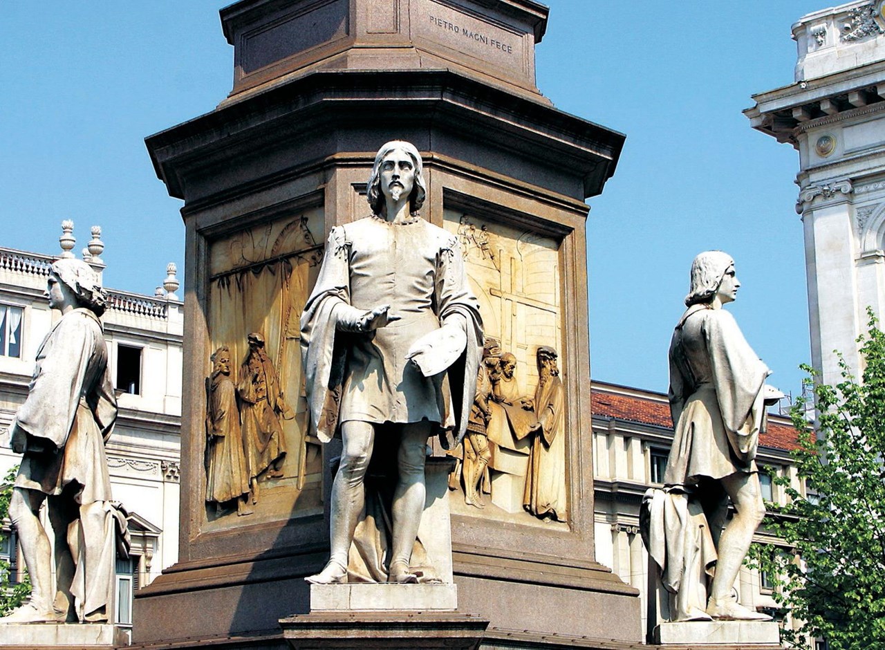 a group of people standing in front of a building