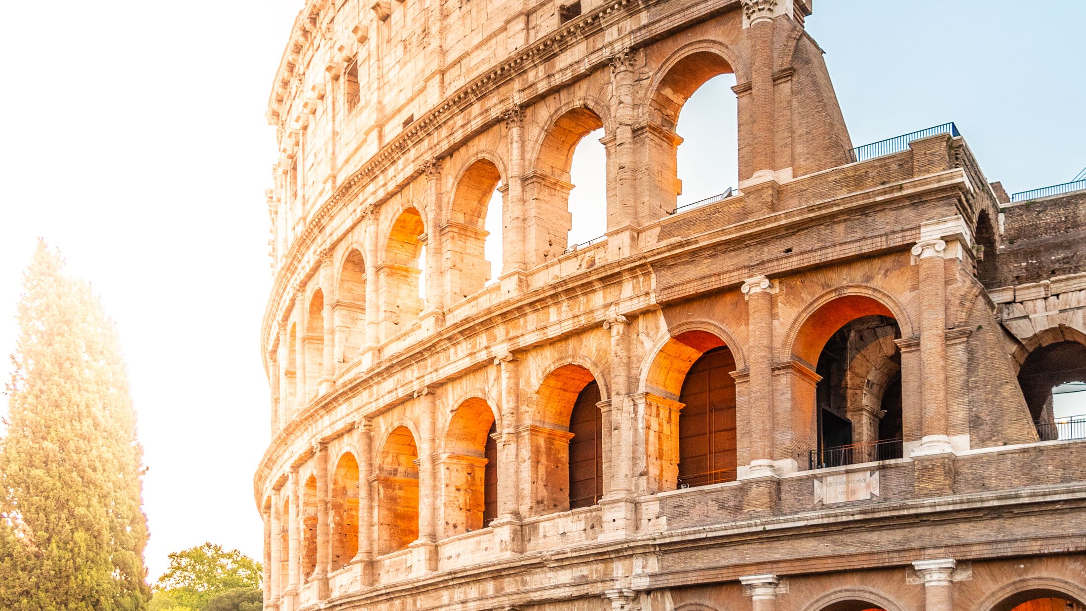 Colosseum, or Coliseum. Morning sunrise at huge Roman amphitheatre, Rome, Italy