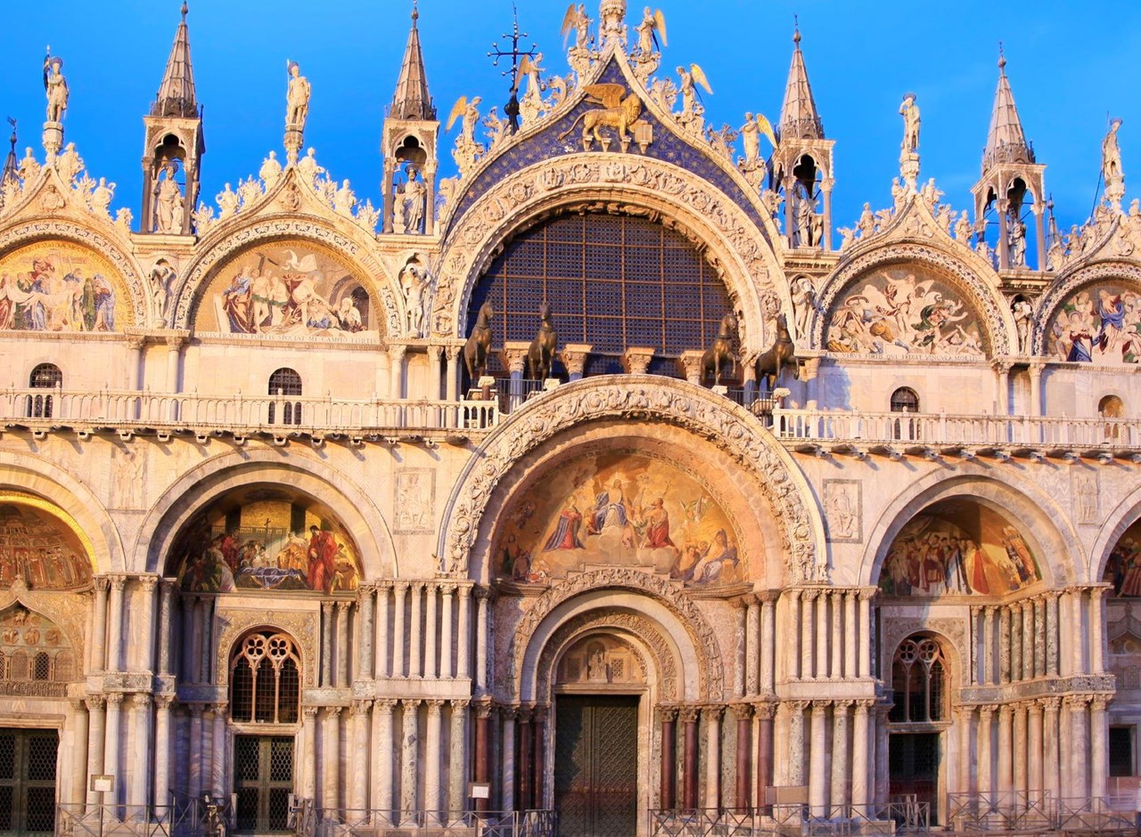 a group of people in front of a large church