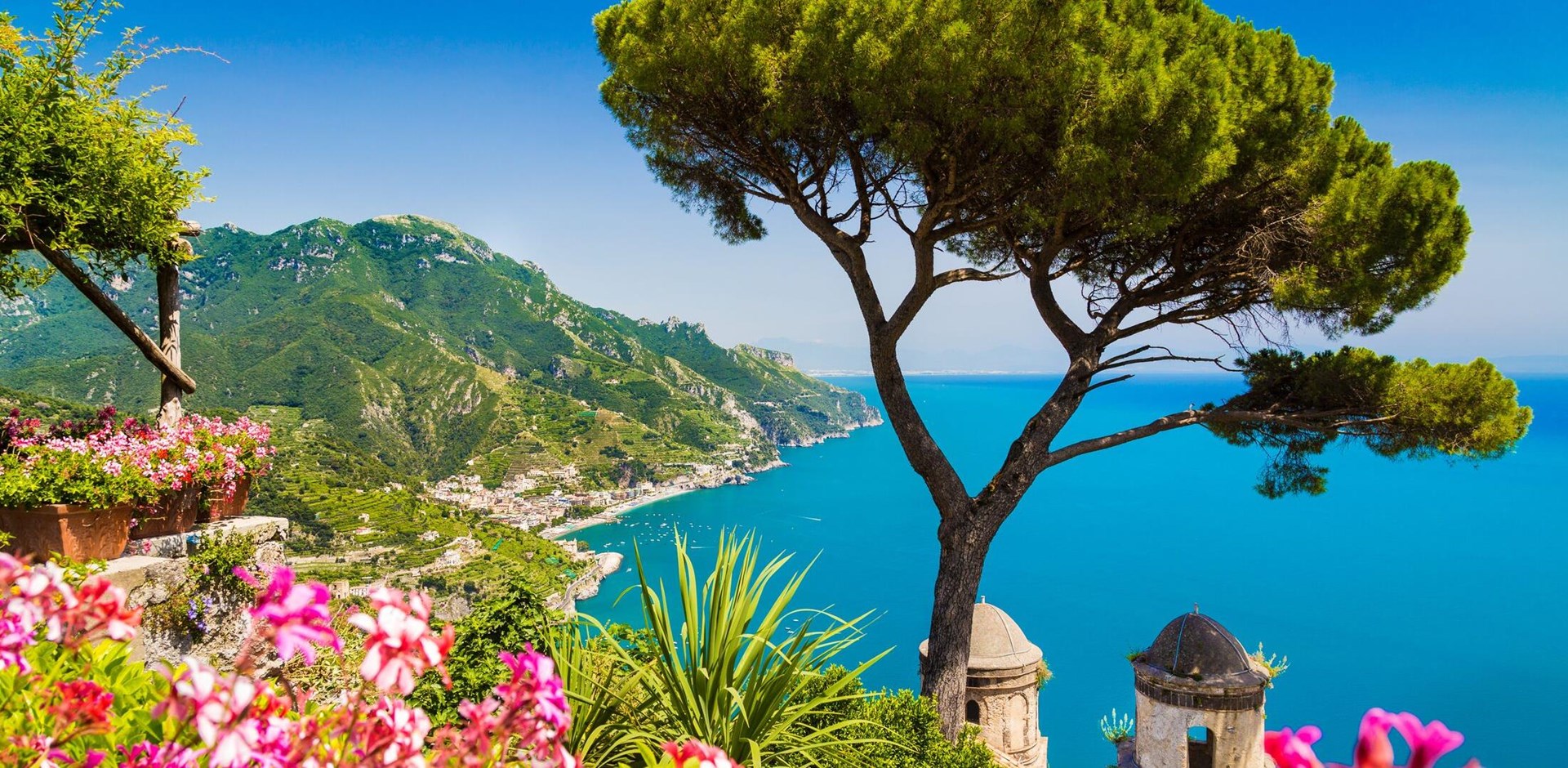 Scenic picture-postcard view of famous Amalfi Coast with Gulf of Salerno from Villa Rufolo gardens in Ravello, Campania, Italy