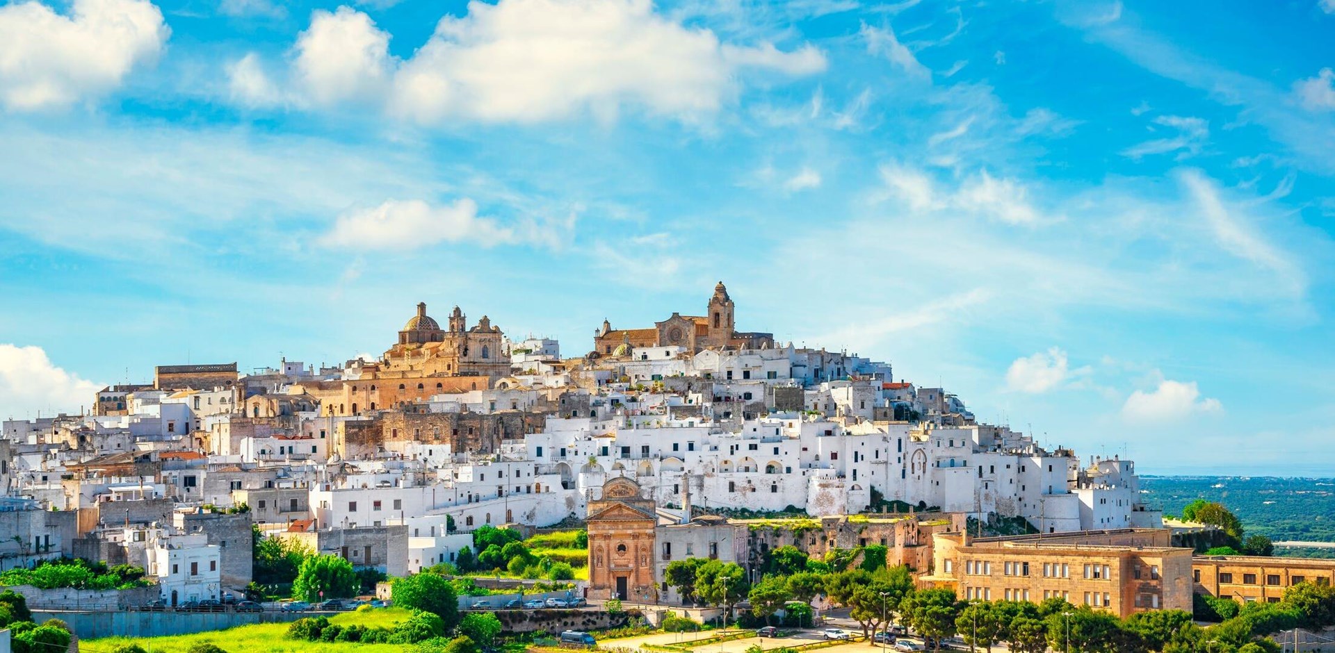 Ostuni white town skyline at sunset, Brindisi, Apulia southern Italy. Europe.