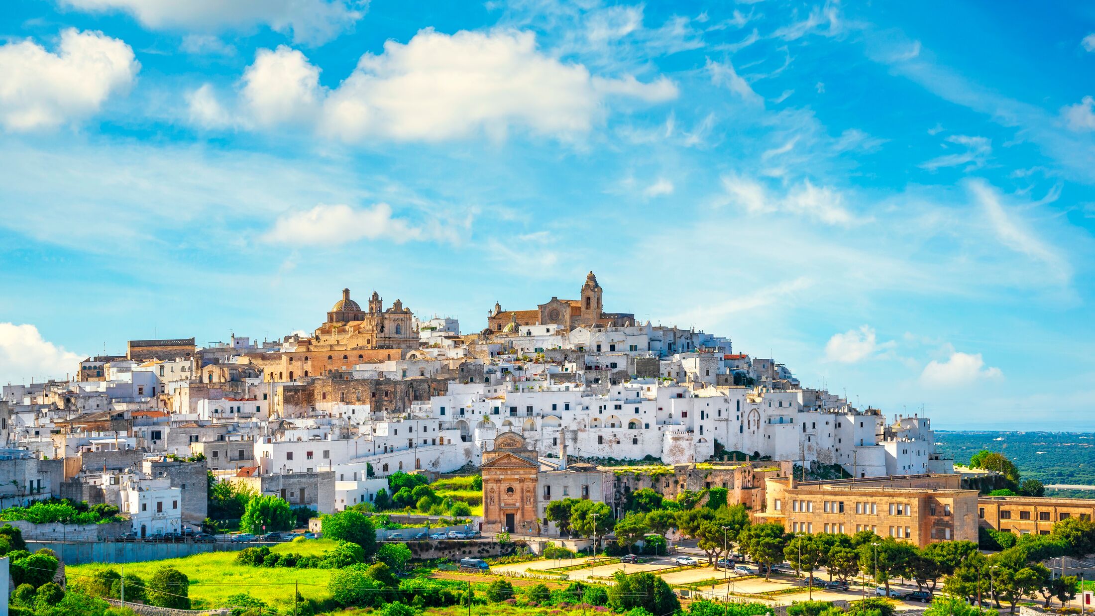 Ostuni white town skyline at sunset, Brindisi, Apulia southern Italy. Europe.