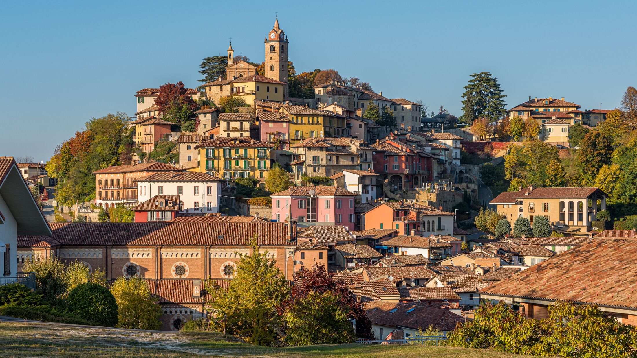 Panoramic sight of Monforte d'Alba village during fall season. Langhe region of Piedmont, Cuneo, Italy.