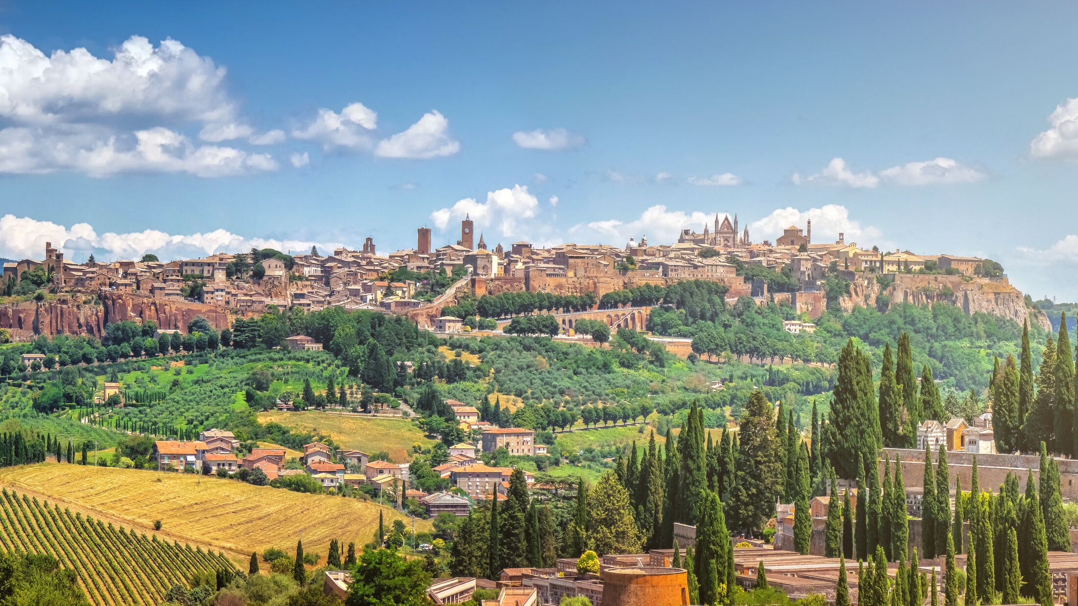 Beautiful panoramic view of the ancient etruscan town of Orvieto on a sunny day with blue sky in summer, Umbria, Italy