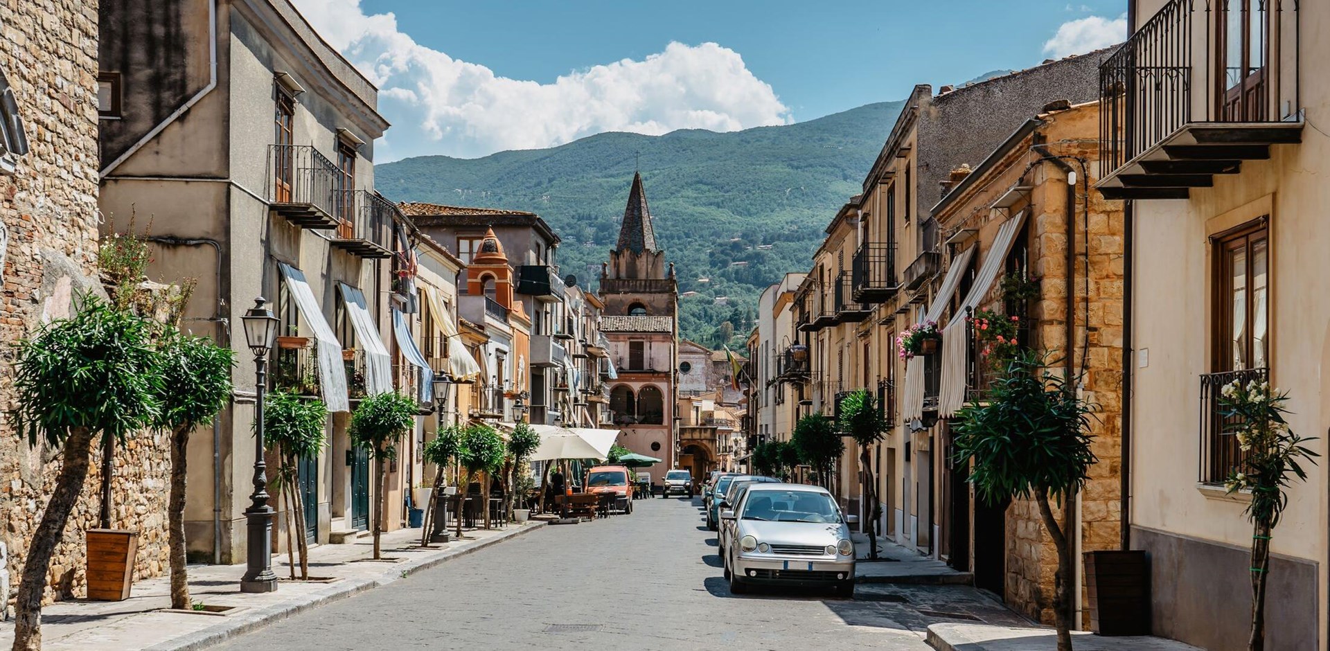 Castelbuono, Sicily. Narrow streets of small medieval village in Park of Madonie.It is known for panettone,typical Sicilian cake.Historical city center,colorful buildings with balconies,urban scene