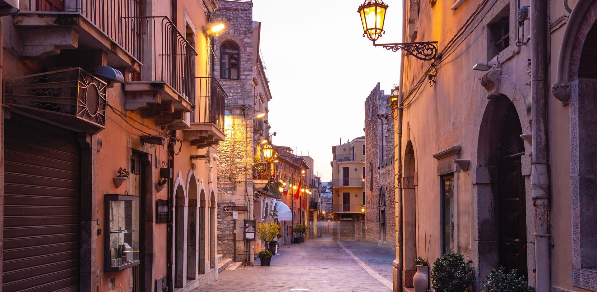 Empty Corso Umberto street near square Piazza Duomo in Taormina in the morning, Sicily, Italy