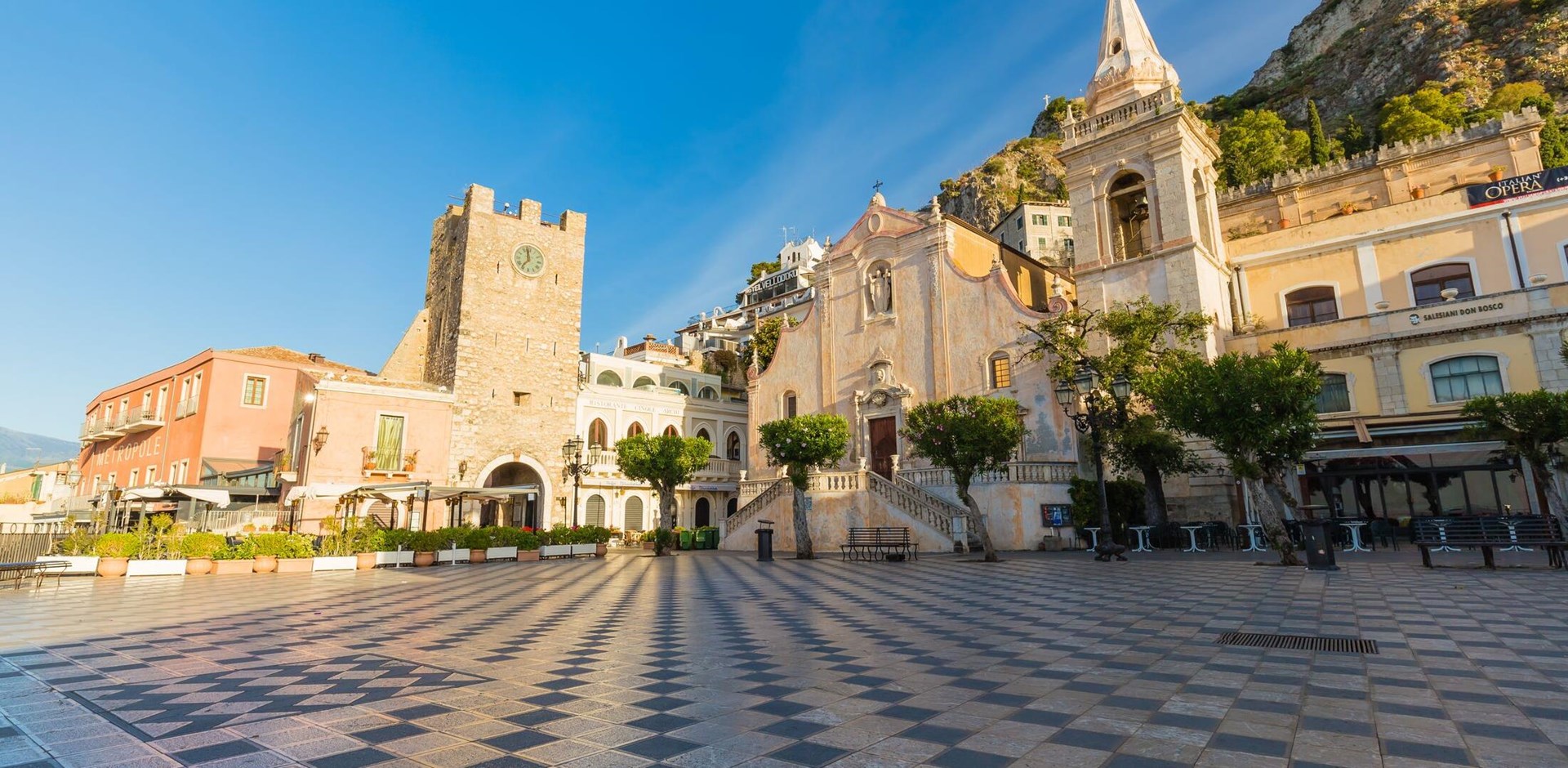 Taormina main square Piazza 9 Aprile, with San Giuseppe church and Corso Umberto street, Taormina, Sicily, Italy