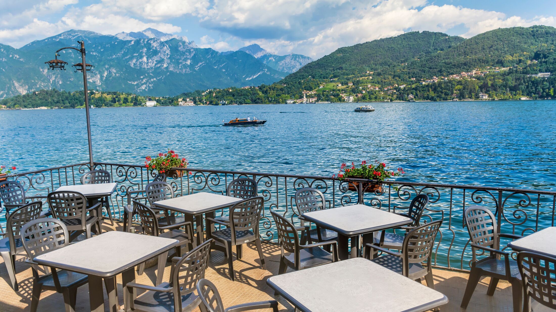 Italian Outdoor Restaurant on the Shore of Como Lake ,North of Italy