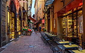 Old narrow street in Bologna, Emilia Romagna, Italy. Architecture and landmark of Bologna. Cozy cityscape of Bologna.