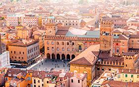 Aerial cityscape view from the tower on Bologna old town center with Maggiore square in Italy