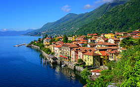 Historical tourist resort town Cannero Riviera on Lago Maggiore lake, Alps mountains, Italy