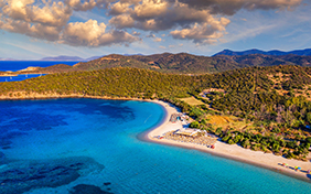 Aerial shot of Tuerredda beach on a beautiful day, Sardinia, Italy. Aerial drone view of Tuerredda in Sardegna. Famous Tuerredda beach on the south of Sardinia near Teulada. Sardinia, Italy.