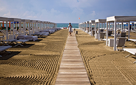 Forte dei Marmi beach with sun umbrellas and tents
