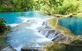 small waterfalls produced by the river elsa in the fluvial park of colle di val d'elsa tuscany italy