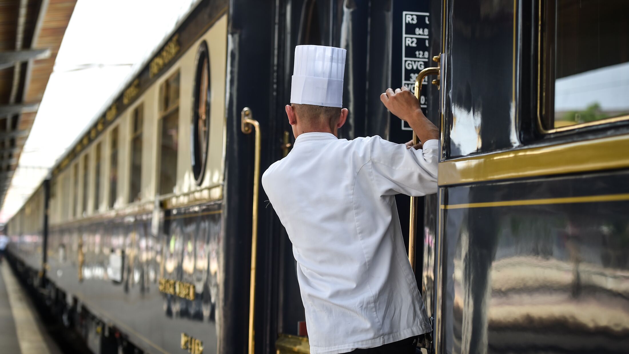 Famous Orient Express long distance passenger train stopped in Bucharest central train station.