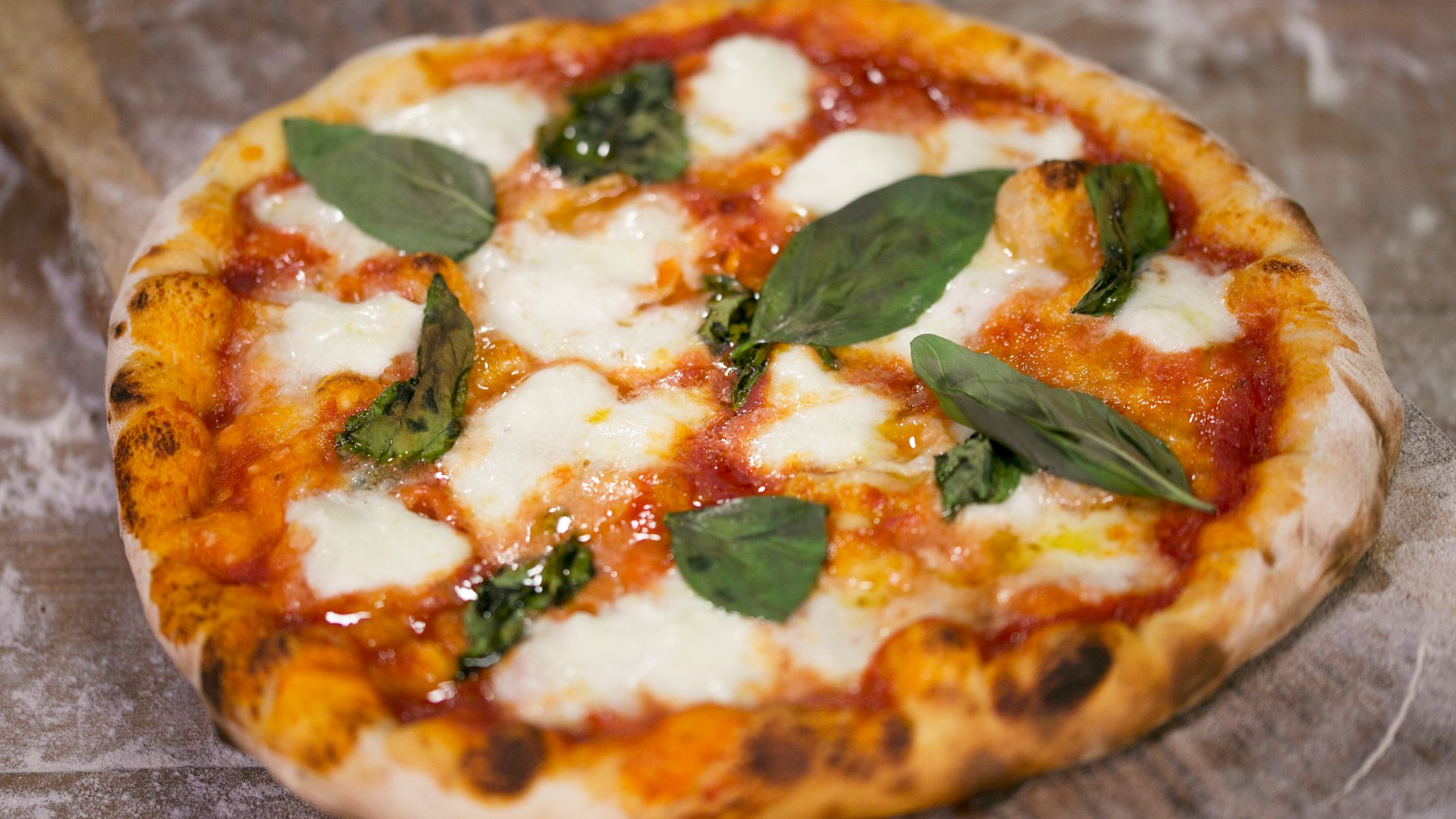 a close up of a slice of pizza