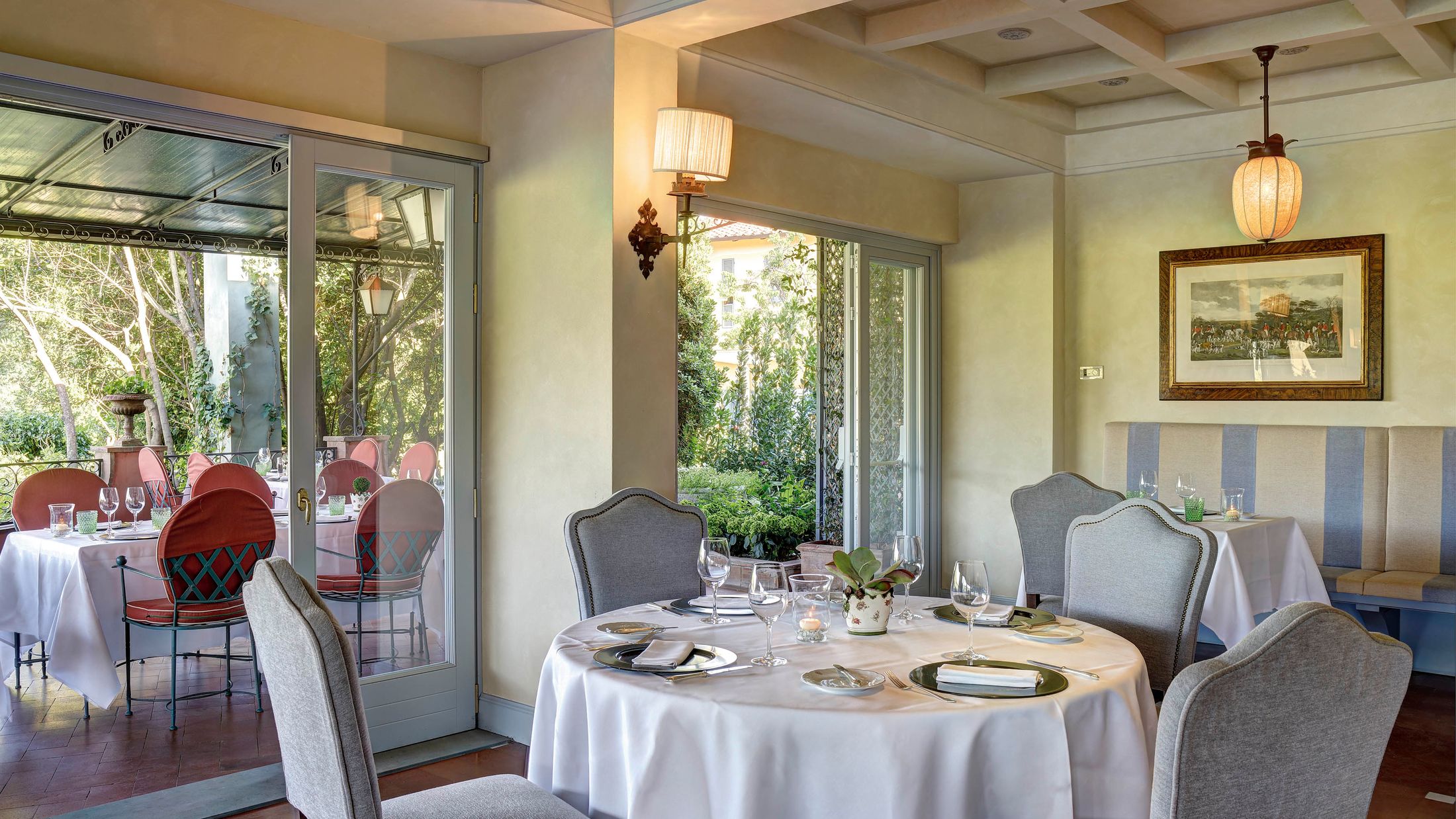 a dining room table in front of a window