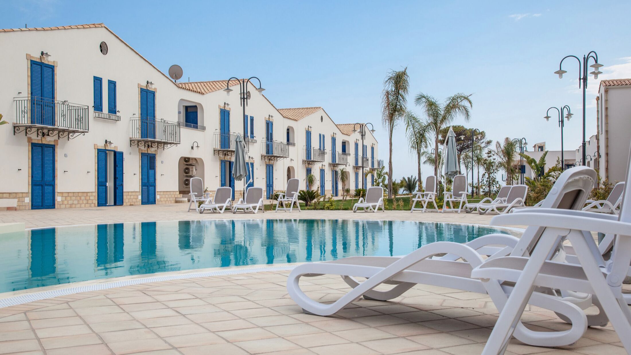 a pool in front of a building