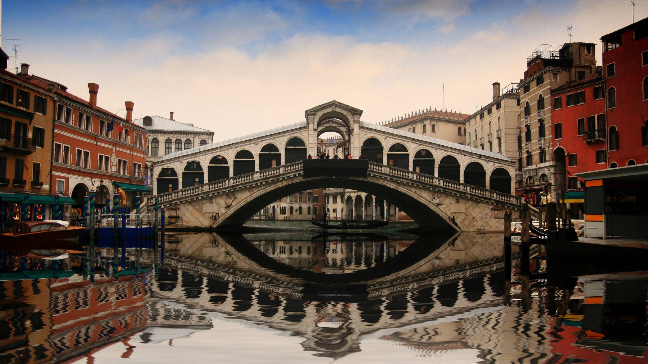 Rialto Bridge over a river in a city